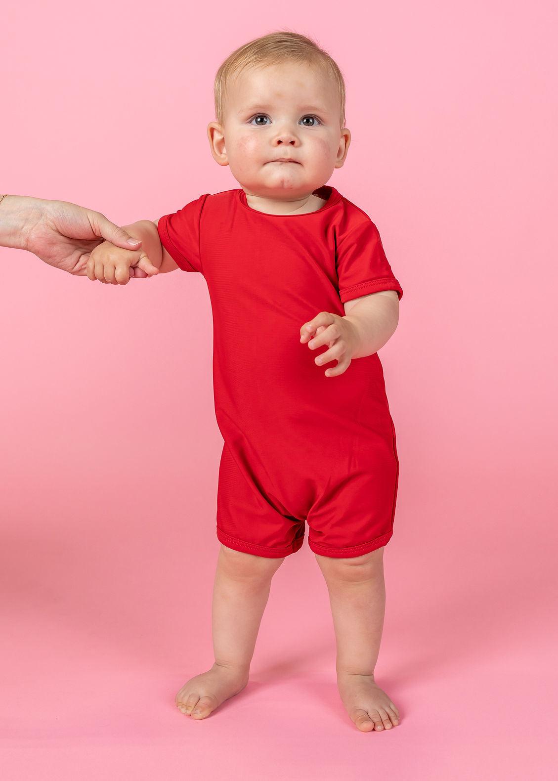 Infant boy deals rash guard